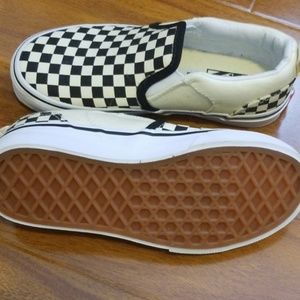 Black and White checkered slip on Vans